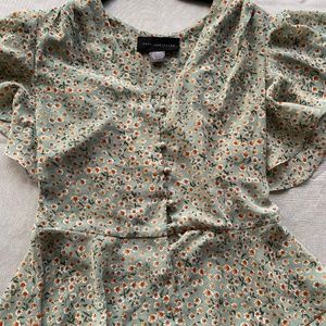 Check Flutter sleeve covered button light crop top